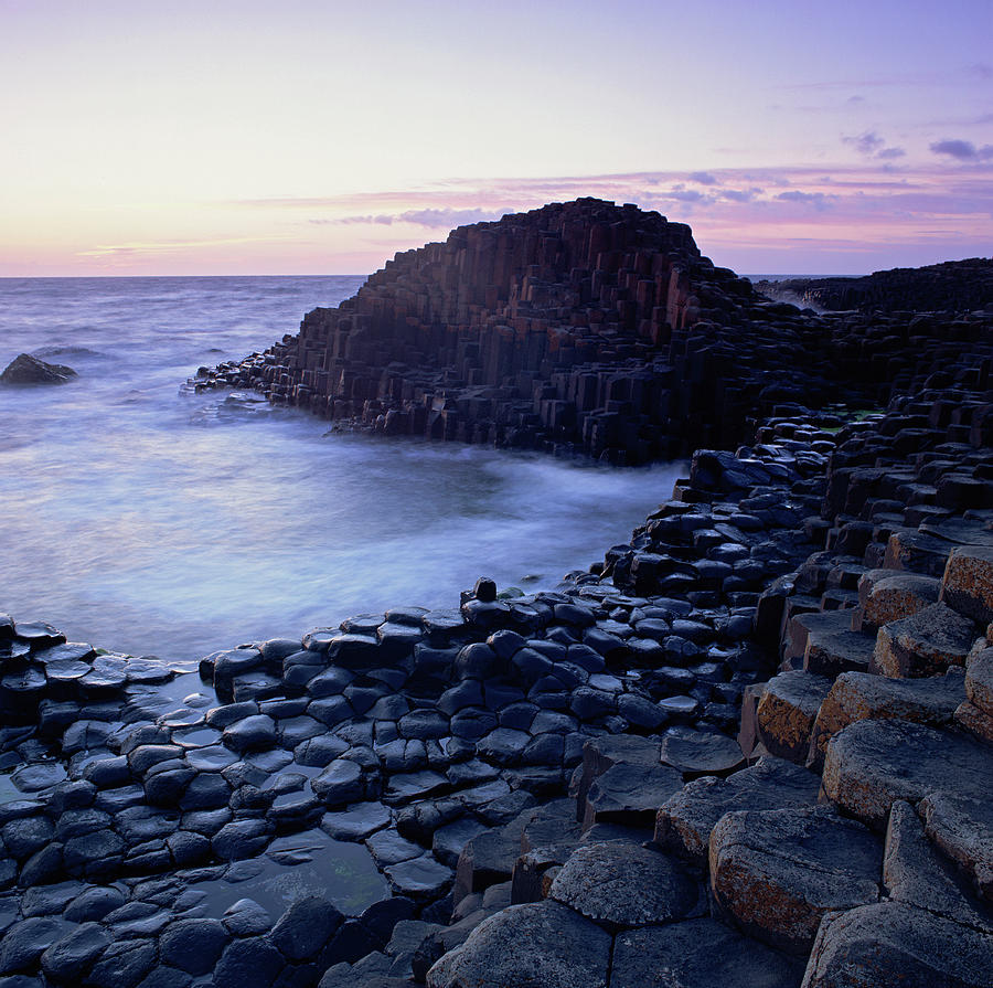 Rock Formations On Beach Photograph by David Henderson