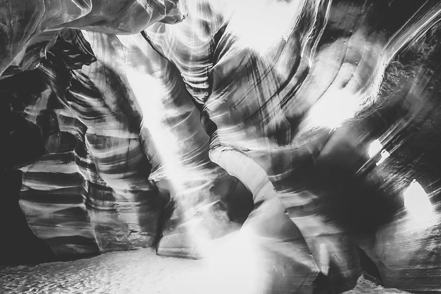 rock in the cave with sunlight at Antelope Canyon, USA in black and white Photograph