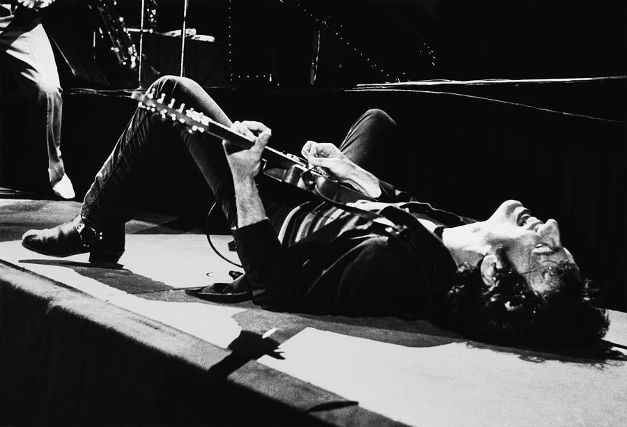 Rock Singer Bruce Springsteen In Concert Photograph by George Rose