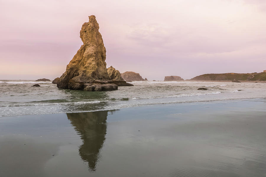 Rock Spire Reflection, Bandon Beach, Oregon Photograph by Dawn Richards