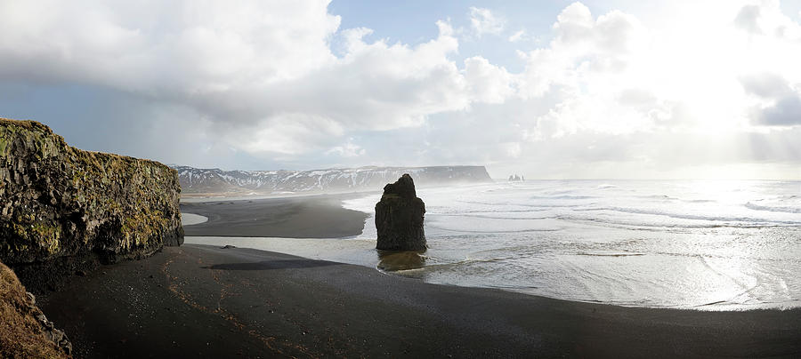Rock-stack, Dyrholaey, Iceland Photograph by Peter Adams
