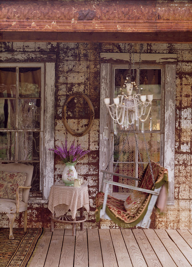 Rocking Bench On Veranda Of Old House With Melancholy Charm Photograph by Brian Harrison