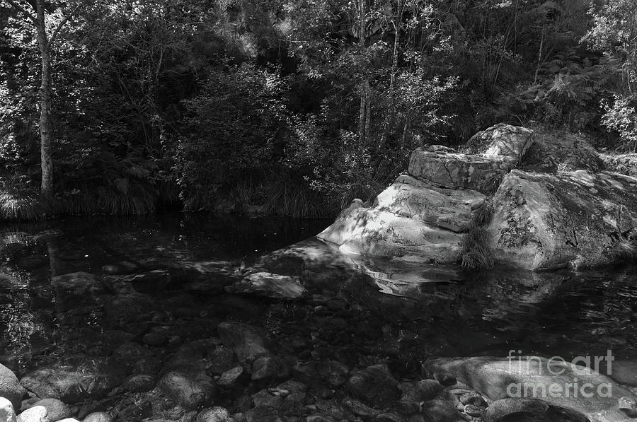Rocks and peaceful river in Carvalhais with monochrome by Angelo DeVal Rocks and peaceful river in Carvalhais with monochrome by Angelo DeVal