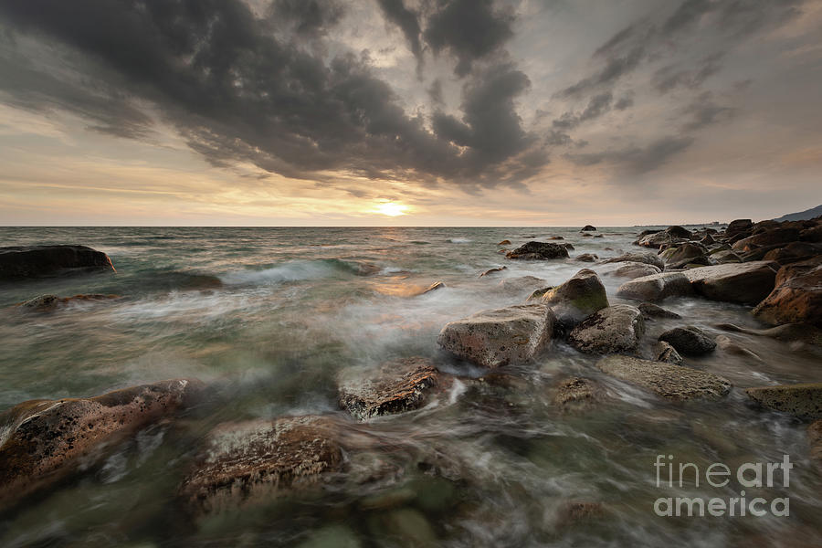 Rocks By The Stormy Sea At Sunset Photograph by Sunrise@dawn Photography