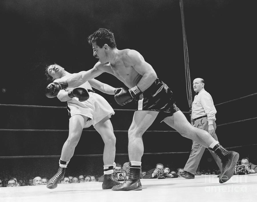 Rocky Graziano Punching Tony Janiro Photograph by Bettmann
