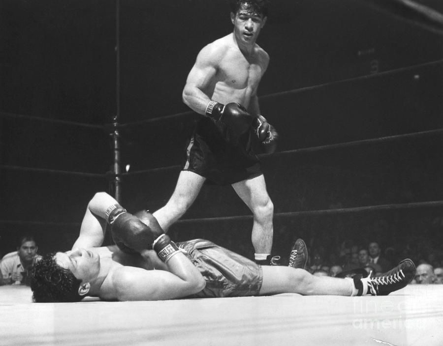 Rocky Graziano Stands Over Opponent Photograph by Bettmann