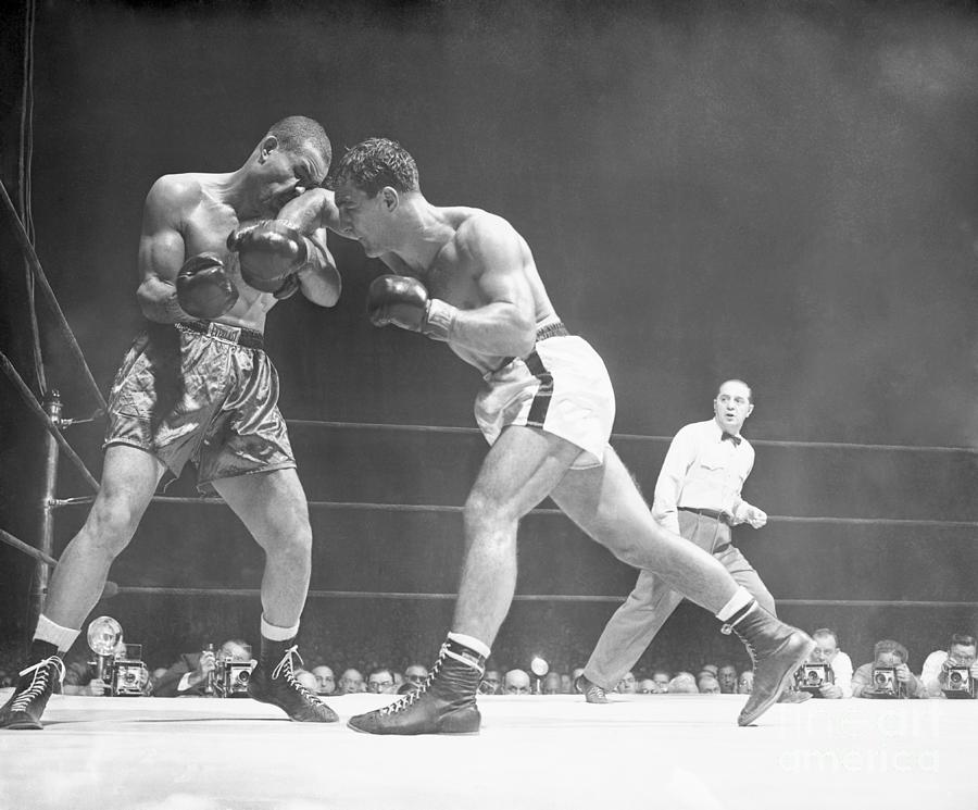 Joe Louis And Rocky Marciano Boxing by Bettmann
