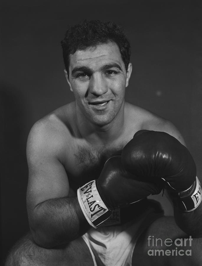 Rocky Marciano In Ring On Ropes Photograph by Bettmann