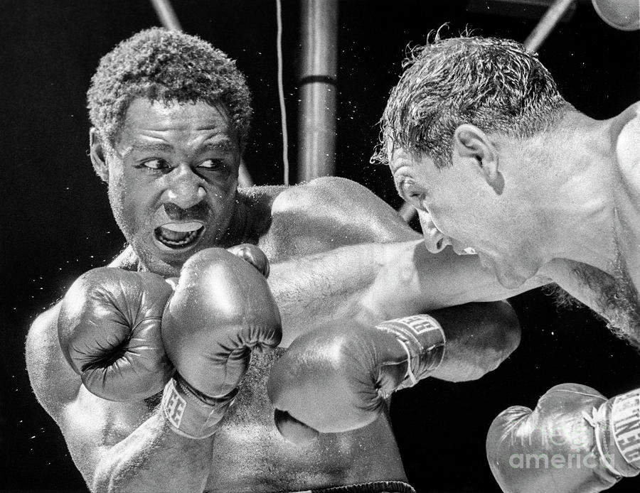 Rocky Marciano Vs Ezzard Charles Photograph by The Stanley Weston Archive