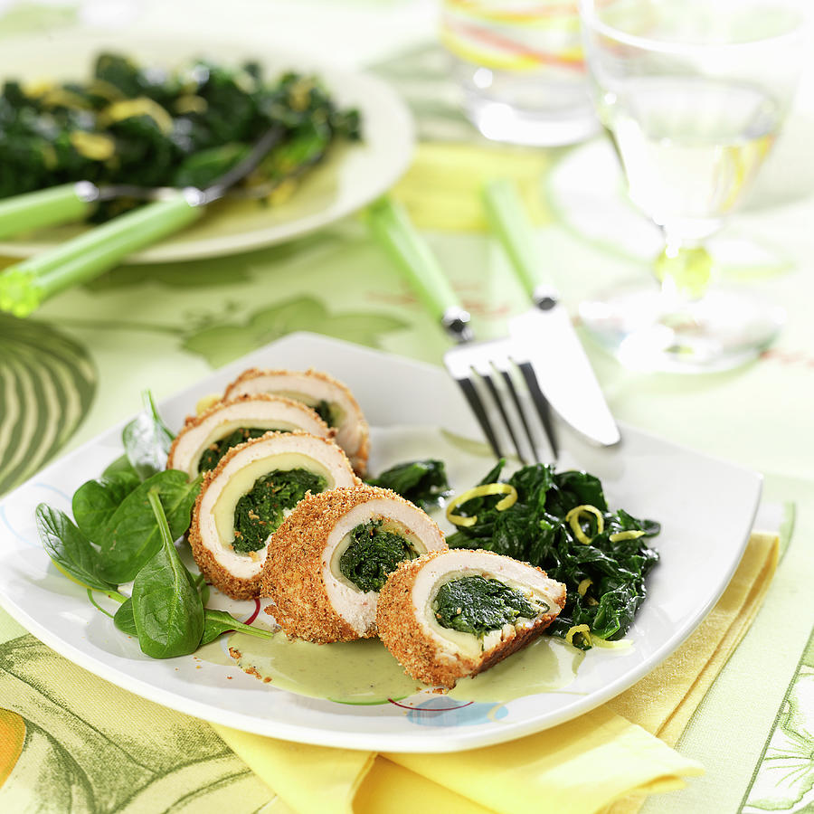Rolled Chicken Fillets Stuffed With Spinach And Comt Photograph by Bertram