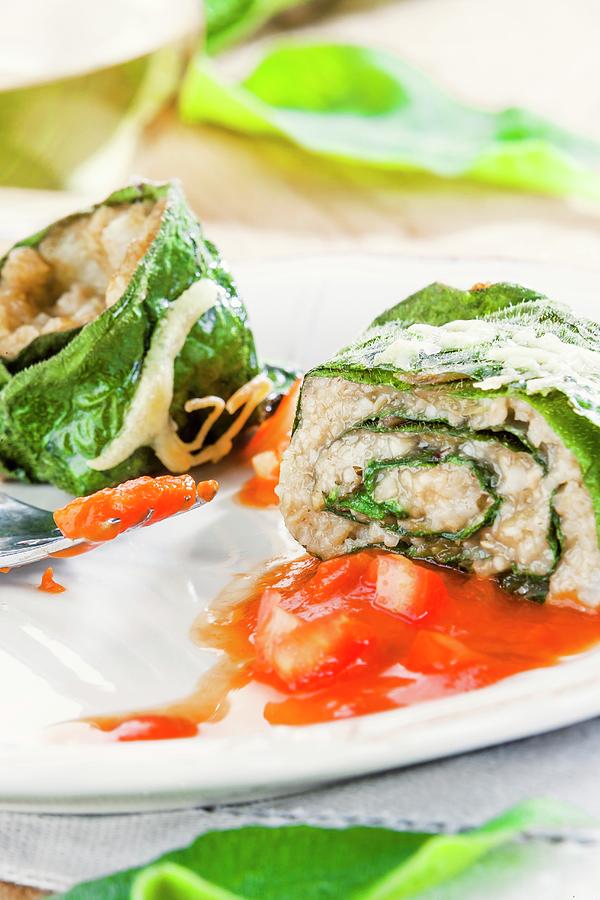 Rolled Comfrey With Freekeh Filling And Tomato Sauce Photograph by Birgit Twellmann