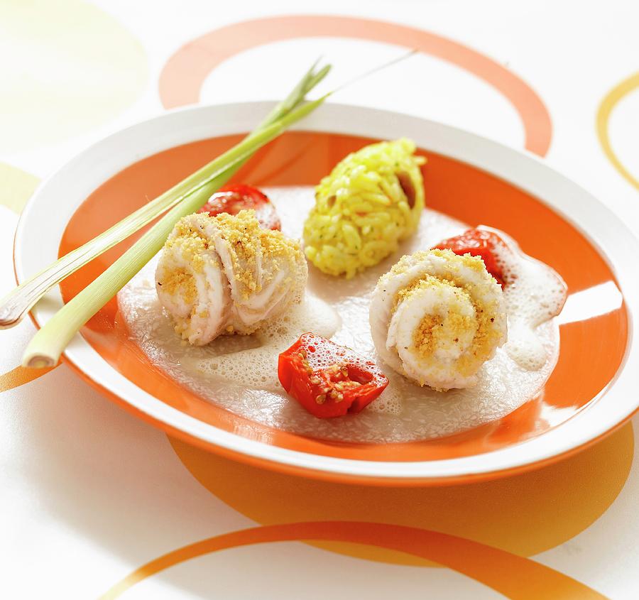 Rolled Sole Fillets Coated In Crushed Peanuts, Citronella Emulsion And Rice With Seafood Photograph by A Point Studio