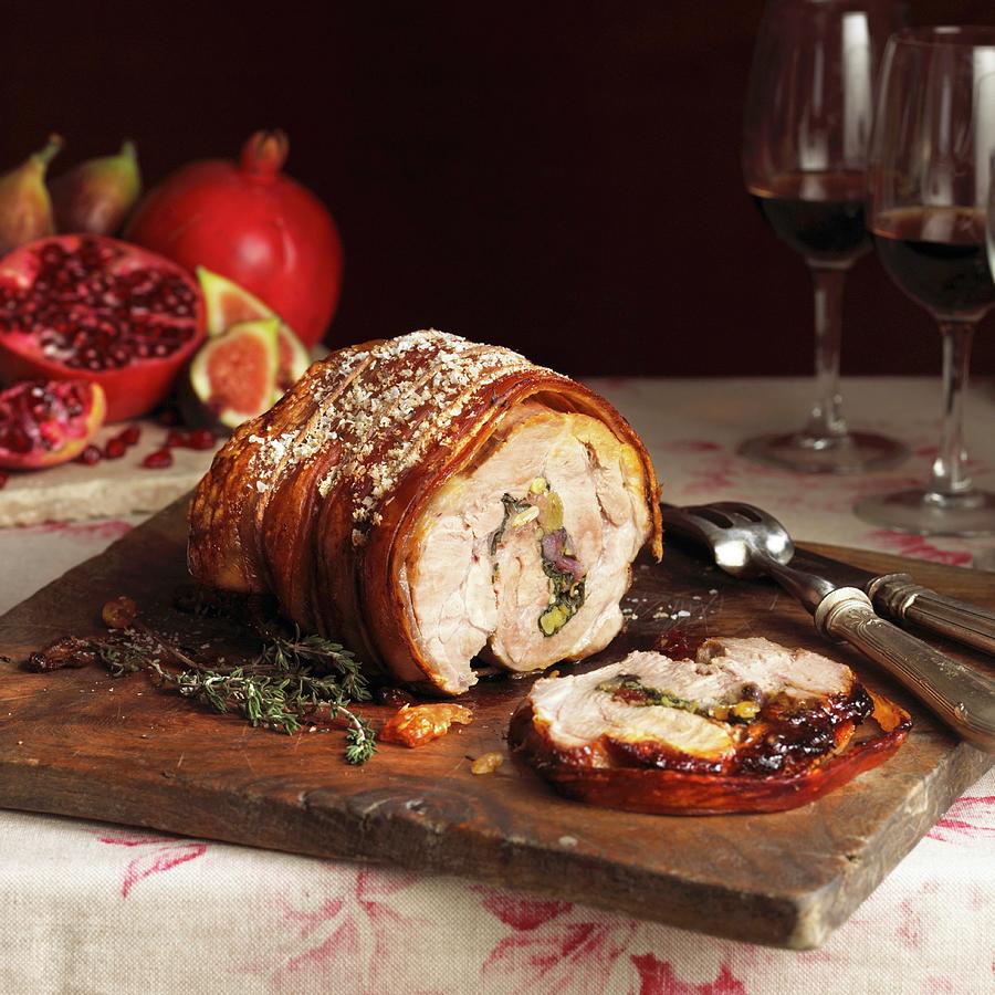 Rolled Stuffed Roast Pork On A Chopping Board, Partly Sliced Photograph by Reavell, William