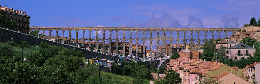 Architecture Photograph - Roman Aqueduct In A City, Segovia, Spain by Panoramic Images