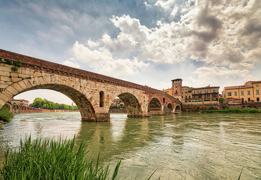 Roman bridge crossing river in Verona Photograph by Vivida Photo PC