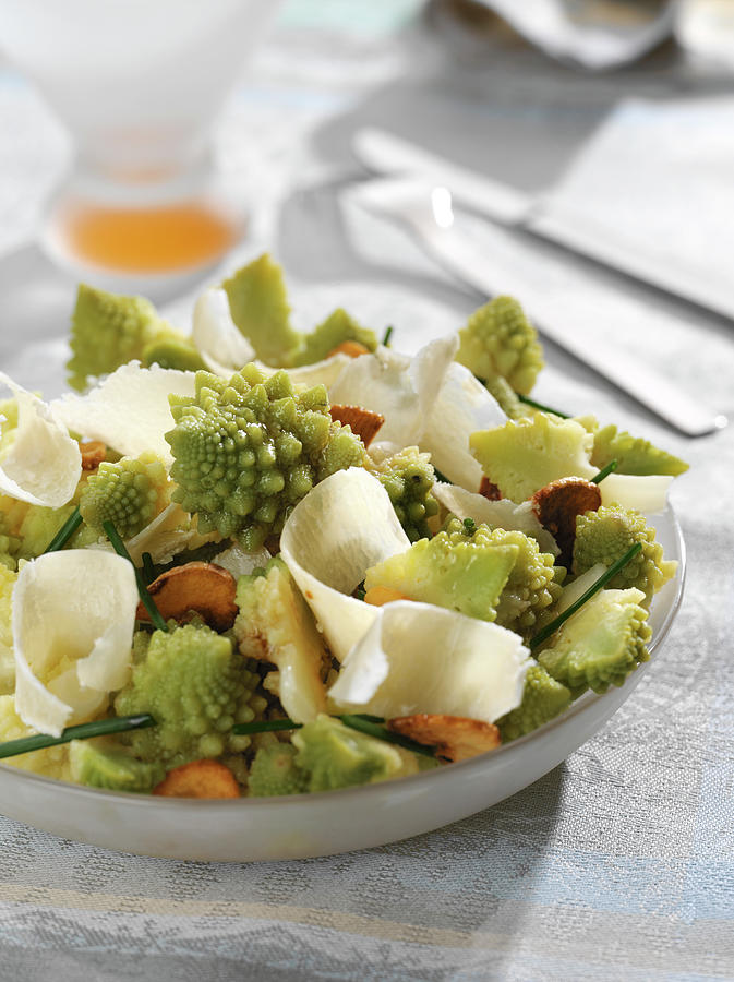 Romanesco Cabbage And Parmesan Salad On A Bed Of Fried Garlic Photograph by Bertram