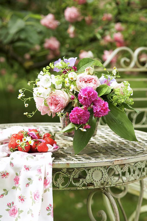 Romantic Bouquet And Fresh Strawberries On Vintage Metal Table In Garden Photograph by Heidi Frhlich