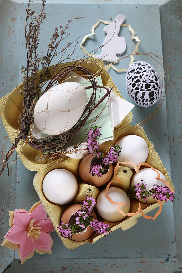 Romantic Easter Arrangement With Heather And Eggs In Egg Box Photograph by Regina Hippel