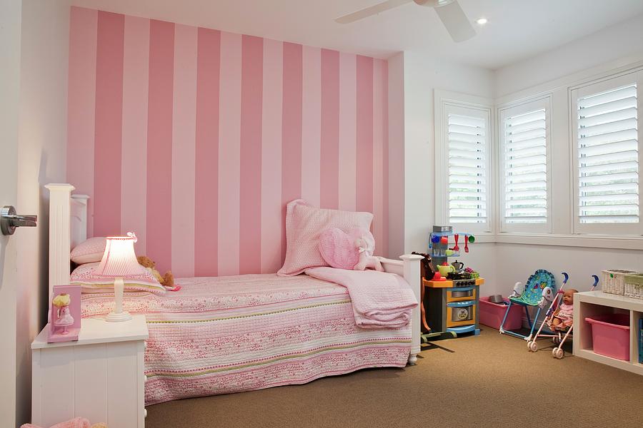Romantic Girl's Bedroom In Pink And White - Vintage Bed Against Striped  Pink Wallpaper Photograph by Bayside - Fine Art America