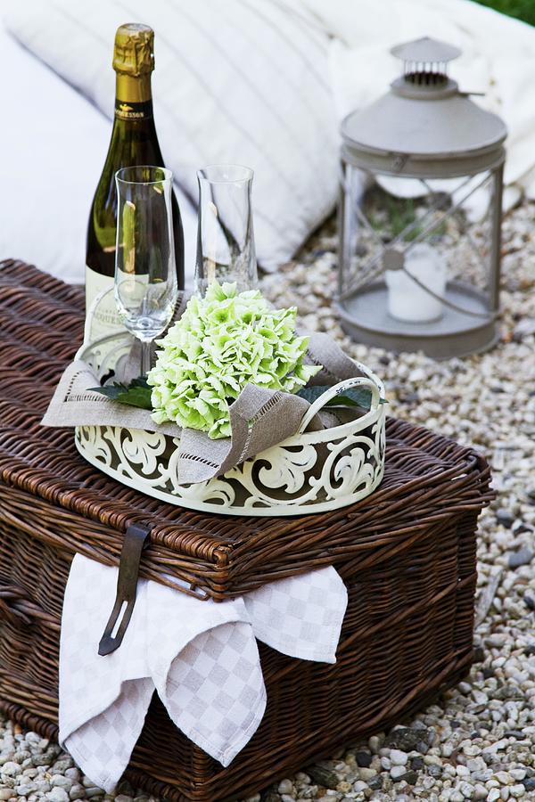 Romantic Picnic With Wine Glasses On Picnic Basket Photograph by Catja Vedder