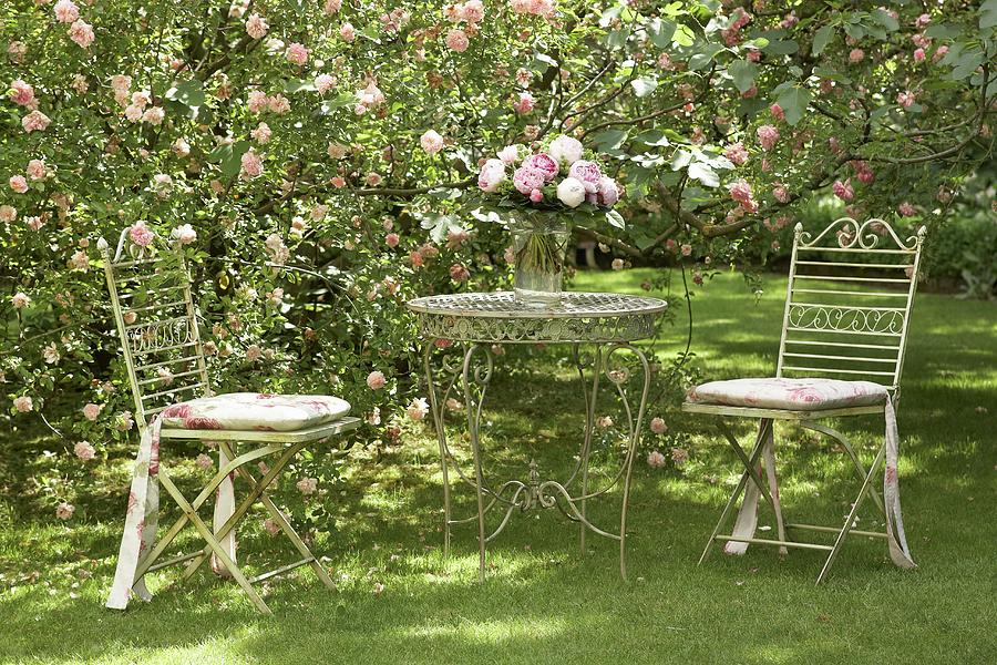 Romantic Retreat In Flowering Rose Garden Photograph by Heidi Frhlich