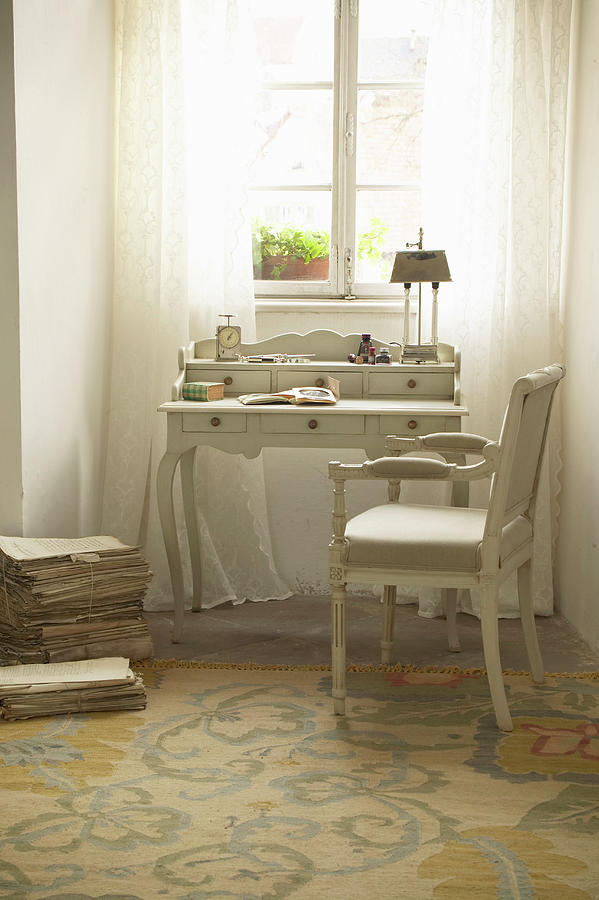 Romantic Writing Desk And Upholstered Chair In Front Of Window Photograph by Werner Krauss