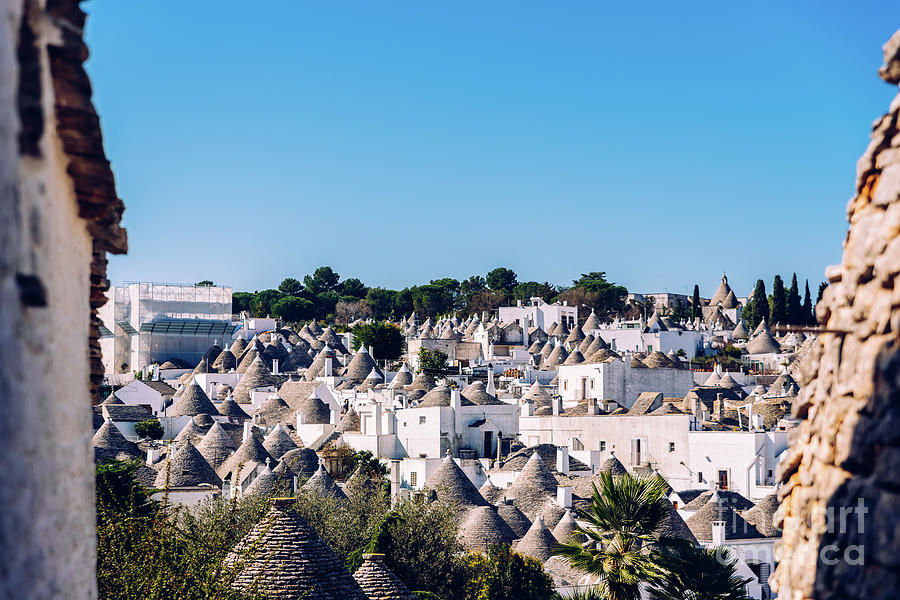 Roofs with symbols in the trulli, in the famous Italian city of Alberobello. Photograph by Joaquin Corbalan