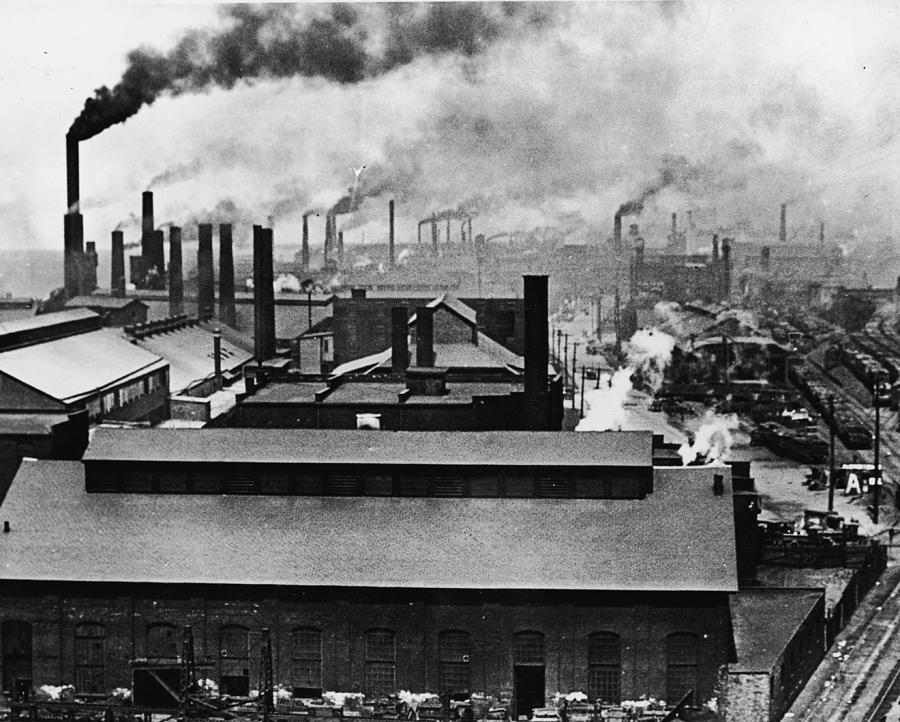 Rooftops And Smokestacks Of Factories Photograph by Welgos