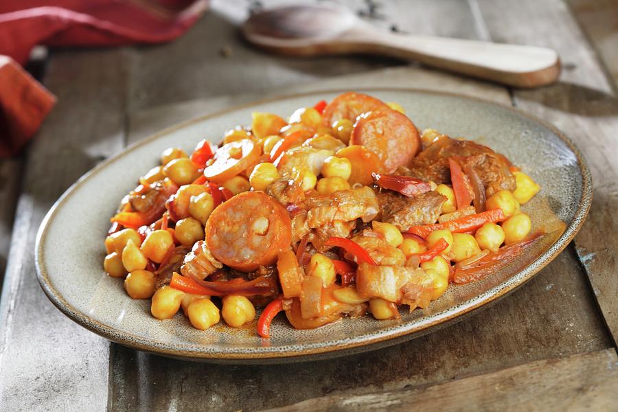 Ropa Vieja chickpea Stew With Sausage, Bacon, Peppers And Tomatoes, From The Canary Islands Photograph by Gastromedia