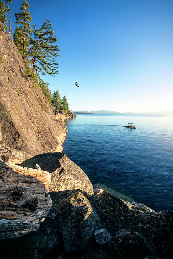 Rope Swing Into Lake Tahoe Photograph by Cavan Images - Pixels