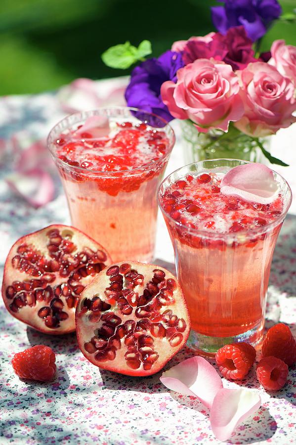 Rose And Pomegranate Drink With Raspberry Syrup Photograph by Winfried Heinze