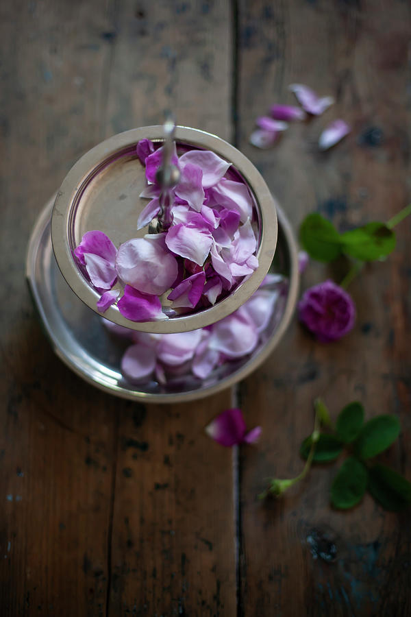 Rose Petals On Cake Stand Photograph by Alicja Koll