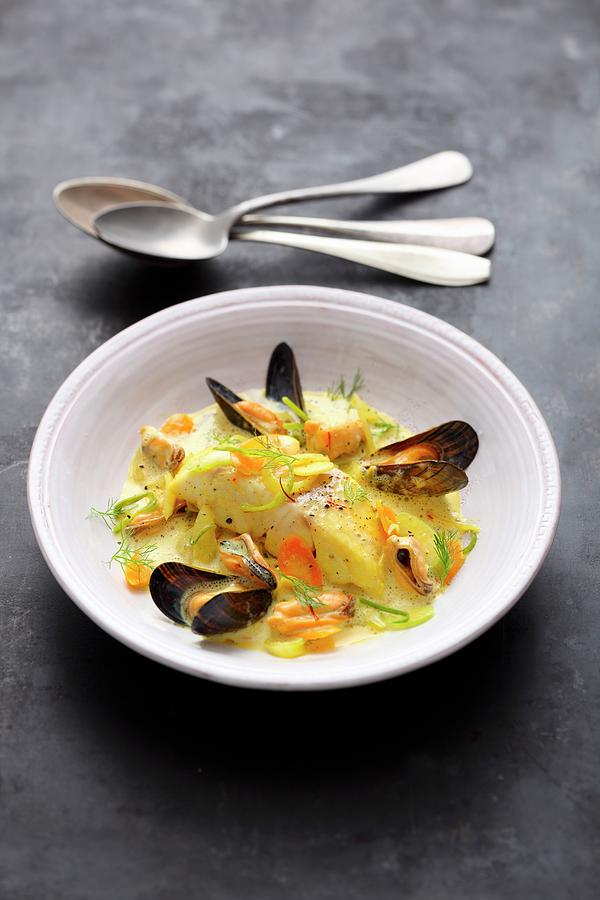 Rosefish And Mussels In A Saffron Curry Broth Photograph by Jalag / Mathias Neubauer