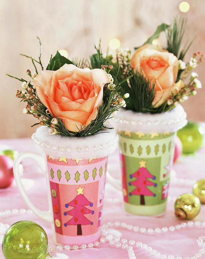 Roses With White Pine In Coloured Beakers With Fir Motif Photograph by Strauss, Friedrich