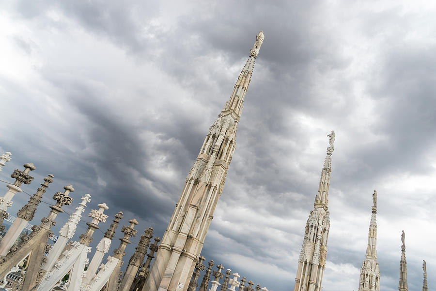 Rough Sky and Airy Spires - Milans Cathedral Duomo di Milano Photograph by Georgia Mizuleva