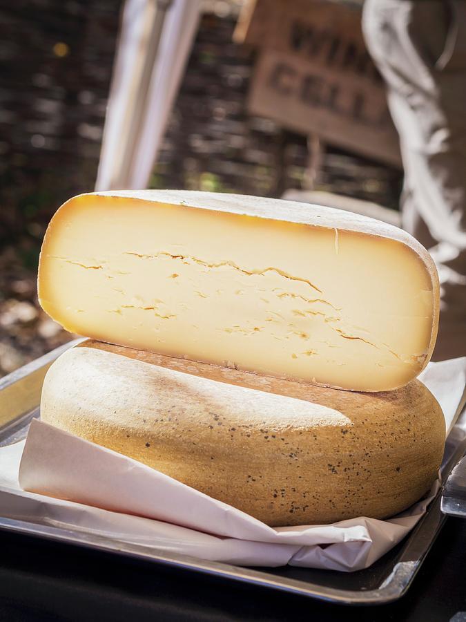 Round Alpkase Cheese Cut In Half. Photograph by Magdalena Paluchowska