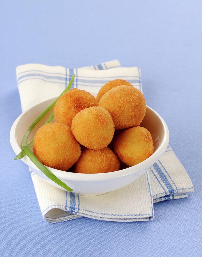 Round Croquettes Photograph by Franco Pizzochero