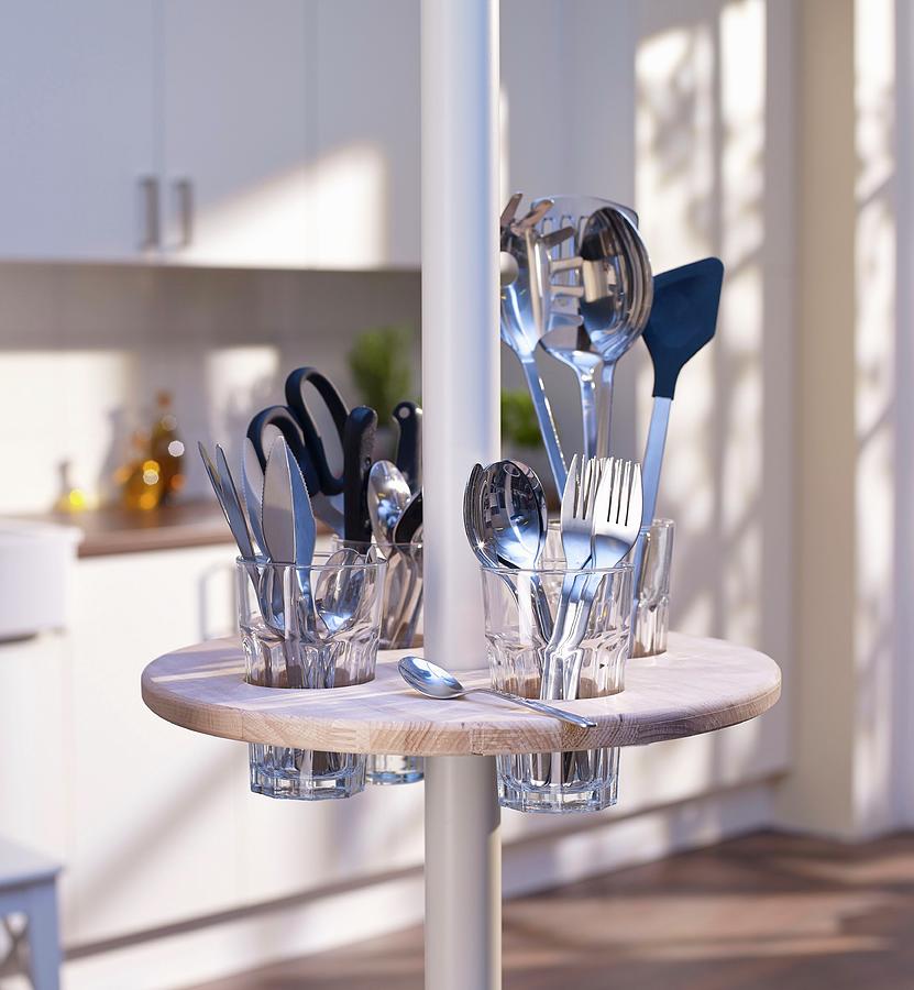 Round Minibar With Cutlery Holders On Telescopic Pole In Kitchen Photograph by Jrgen Holz