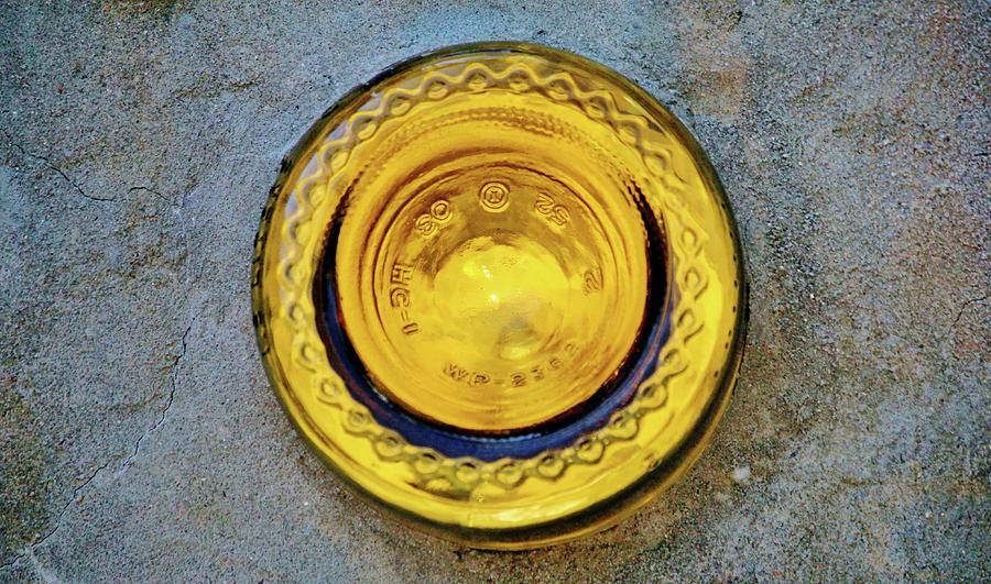 Round Yellow Glass Bottom Photograph by Cynthia Guinn