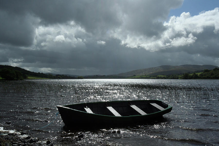 Row boat on Lake Gartan Co. Donegal Ireland Photograph by Peter