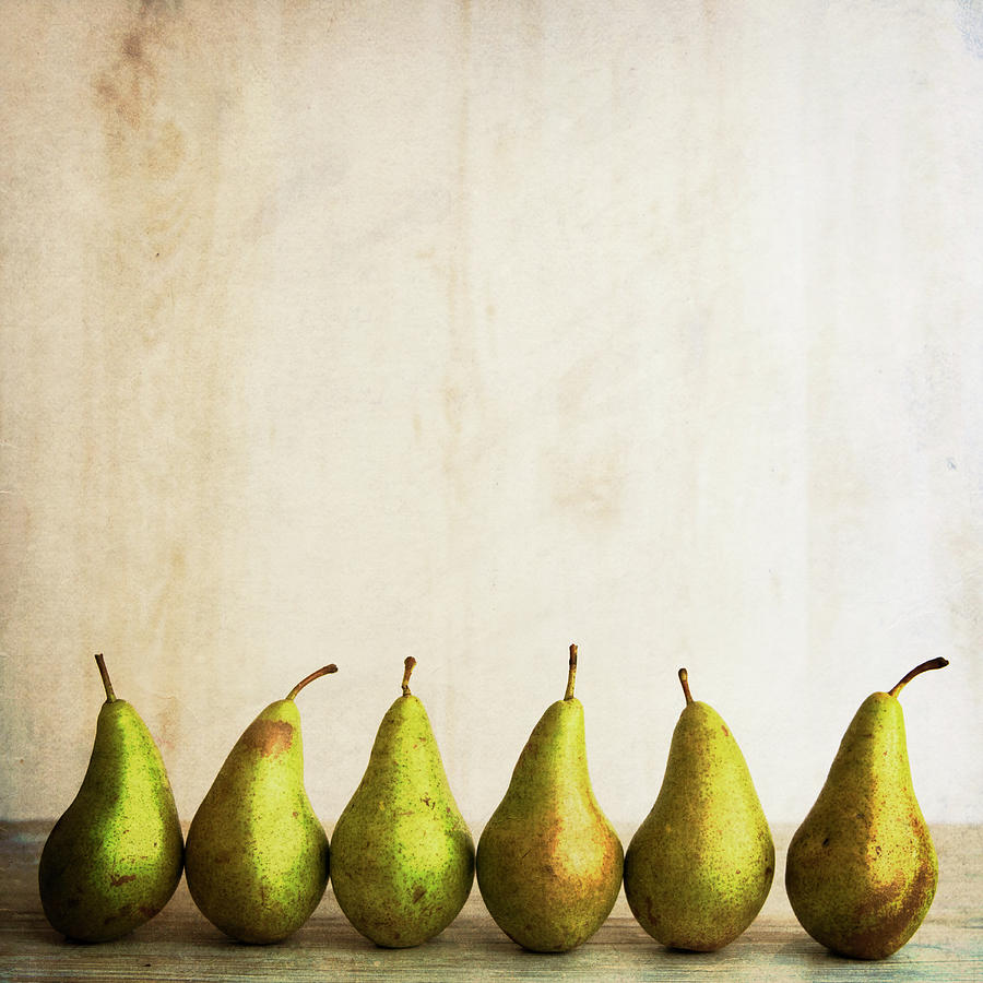 Row Of Antique Pears Photograph by Tom Quartermaine - Fine Art America