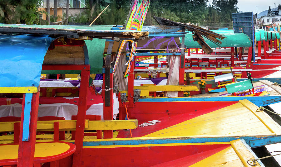 Row of Colorful Boats in Mexico Photograph by Amy Sorvillo