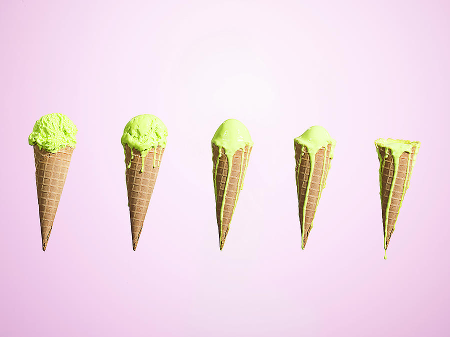Row Of Melting Ice Creams At Different Photograph by Jonathan Knowles