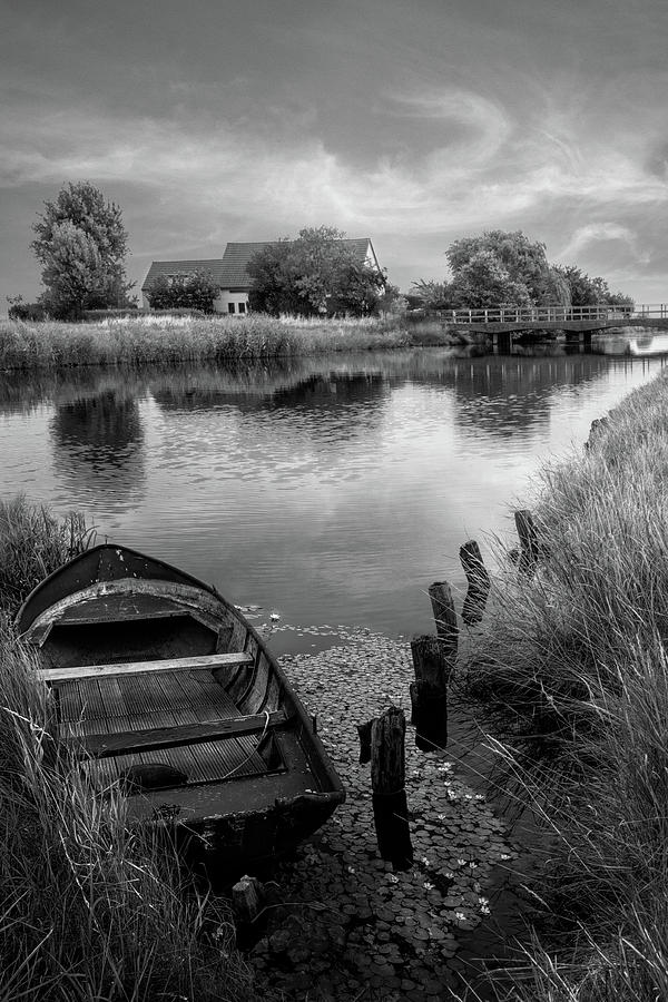 Rowboat at Sunset in Black and White Photograph by Debra and Dave Vanderlaan