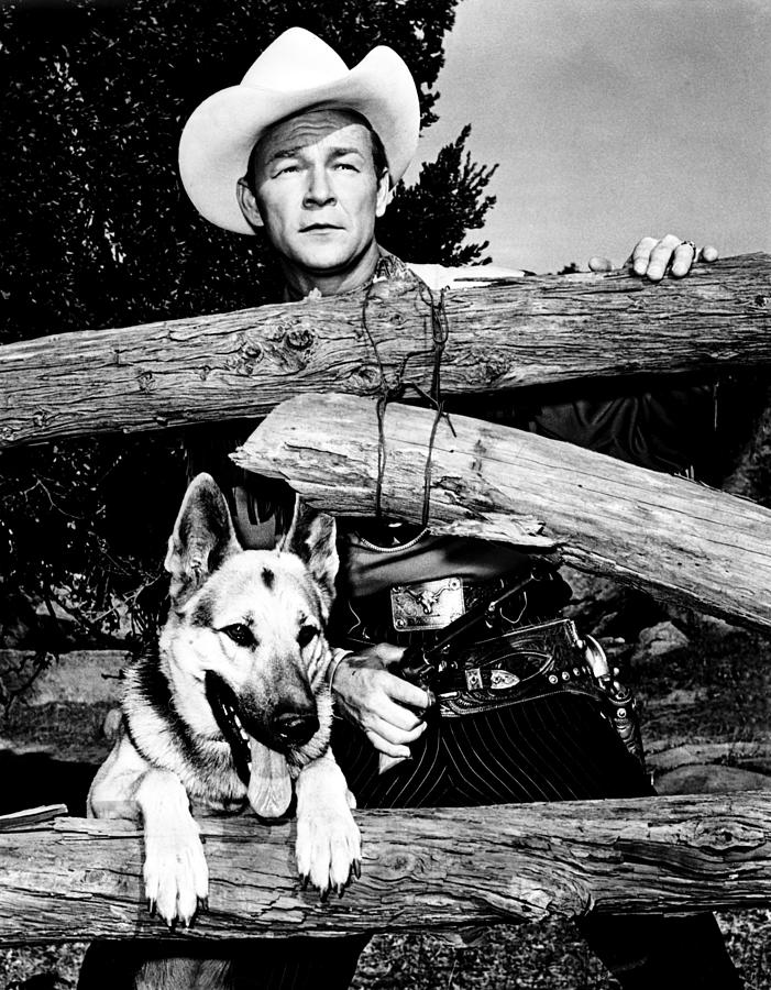 Roy Rogers With Dog Standing At Fence Photograph by Globe Photos - Fine ...