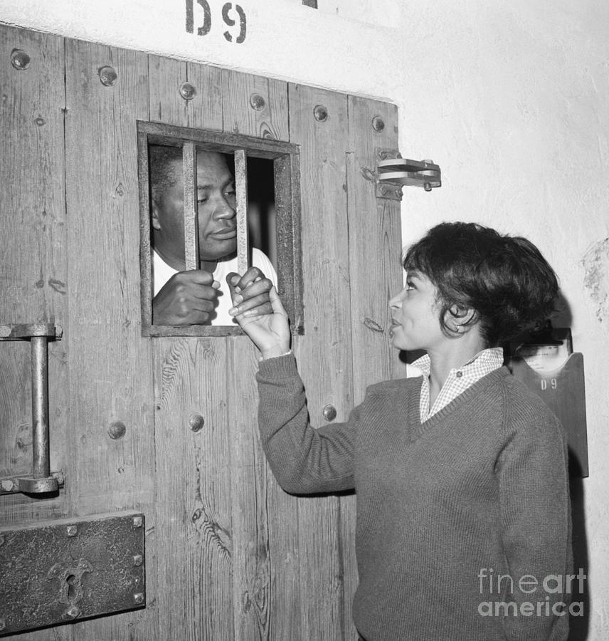 Ruby Dee Locking Up Husband Ossie Davis Photograph by Bettmann