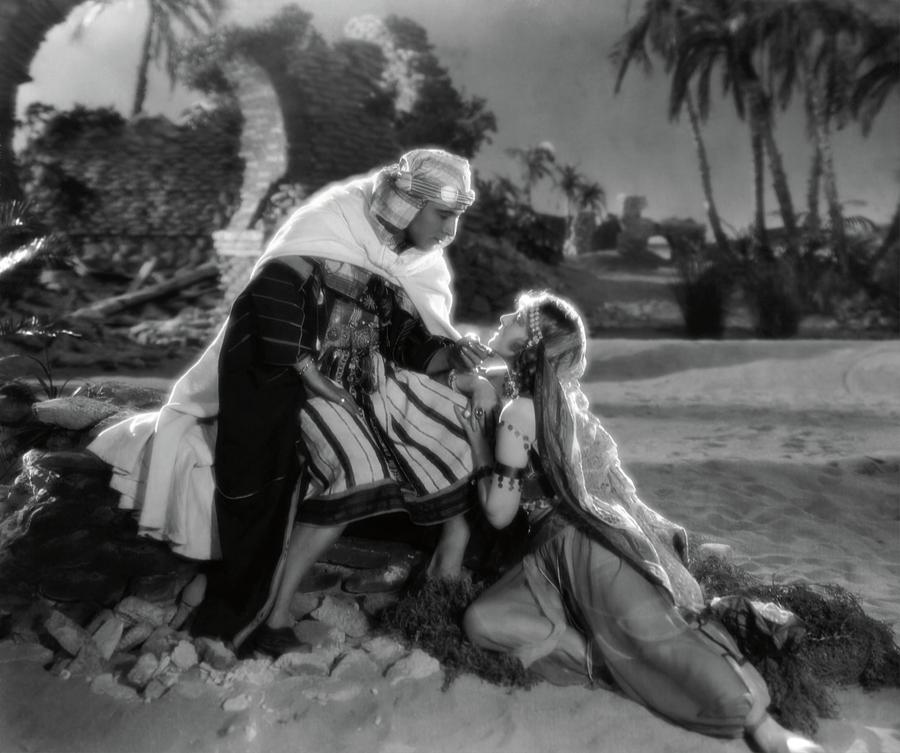 RUDOLPH VALENTINO and AGNES AYRES in THE SON OF THE SHEIK -1926-. Photograph by Album