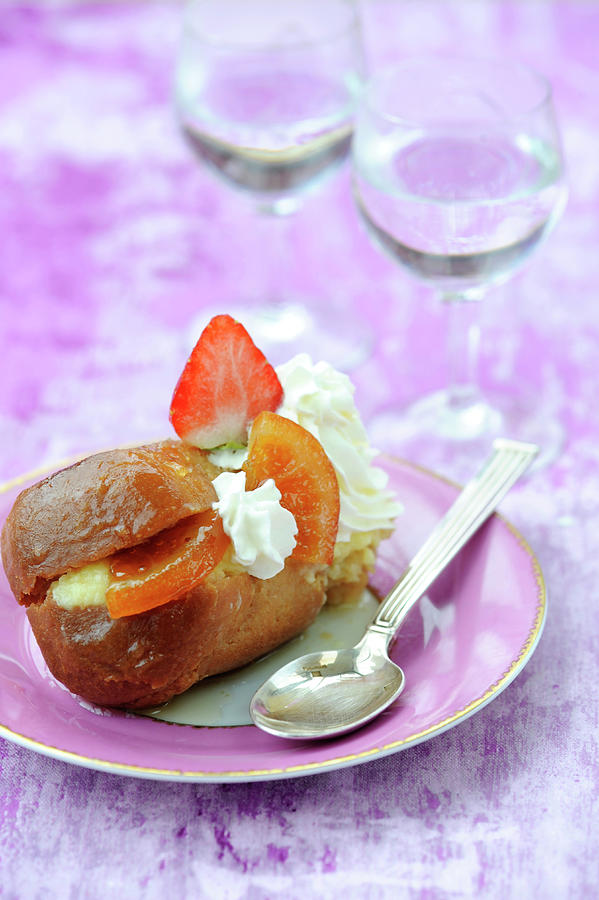 Rum Baba With Whipped Cream,confit Orange And Strawberries Photograph by Schmitt