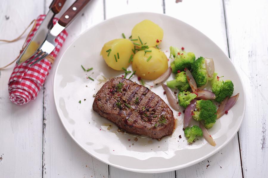 Rump Steak With Potatoes And Broccoli Photograph by Frank Weymann