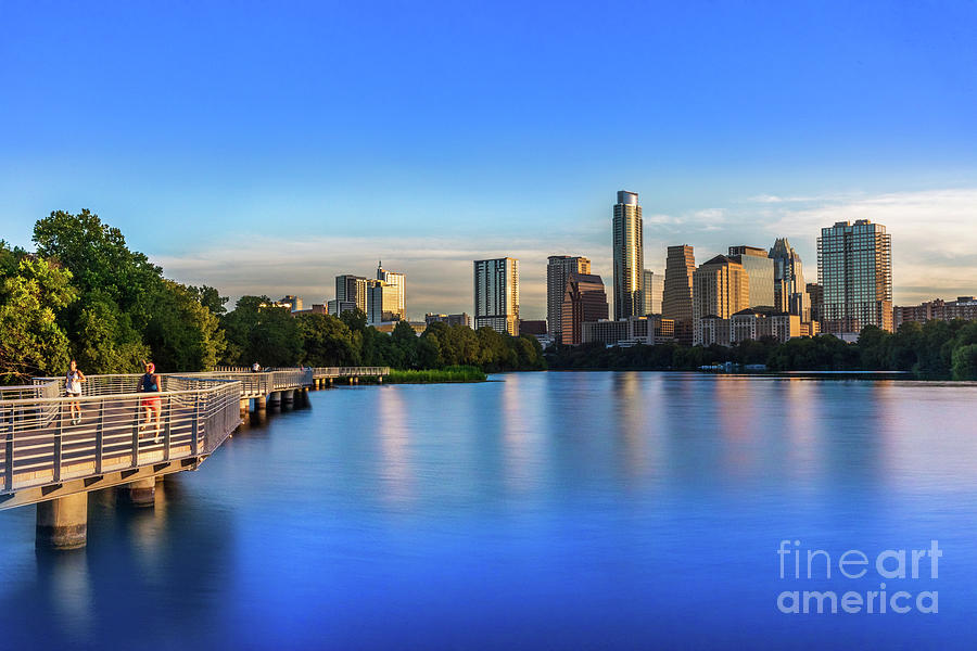 Austin Skyline Photograph - Runners, joggers and bikers take an early morning stroll on the the Boardwalk Trail by Dan Herron